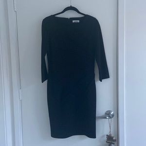 Black dress. 3/4 length sleeve
